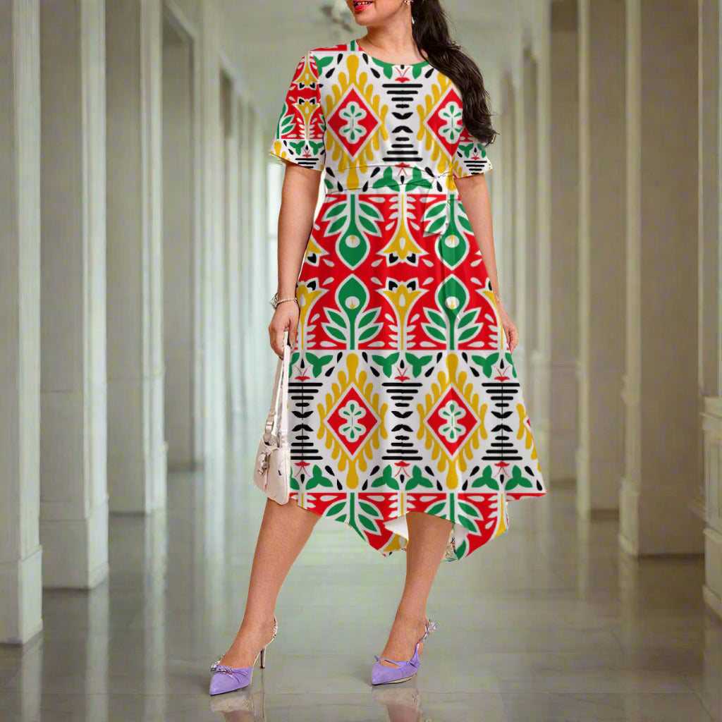 Woman wearing a colorful patterned dress on a white background