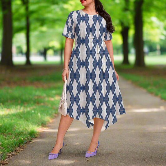 Woman wearing a blue and white patterned dress. 