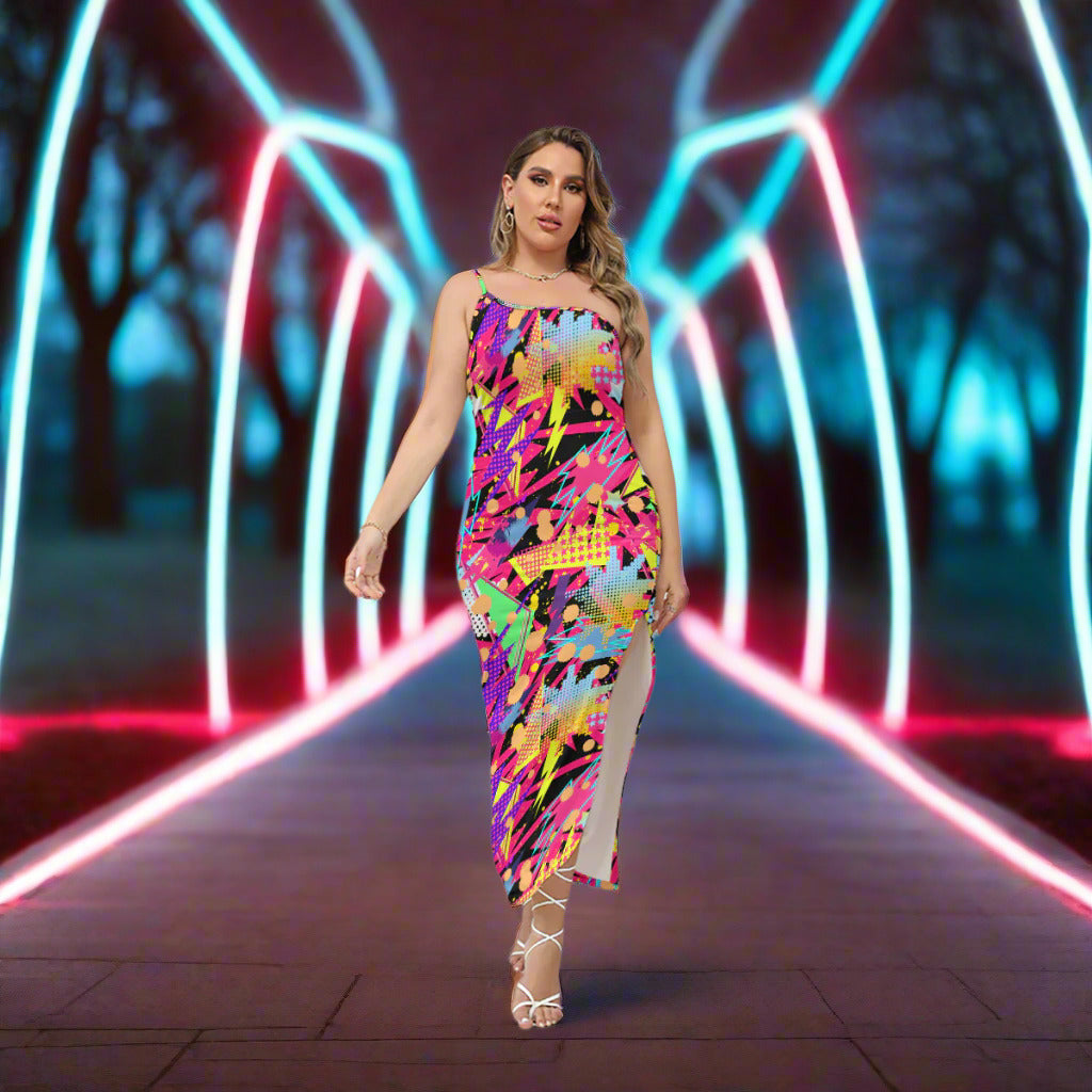Woman wearing a colorful dress walking down a neon lit pathway in the park.