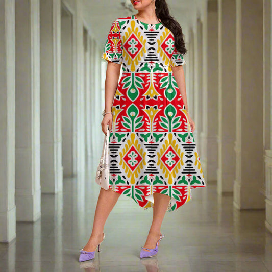 Woman wearing a colorful patterned dress on a white background